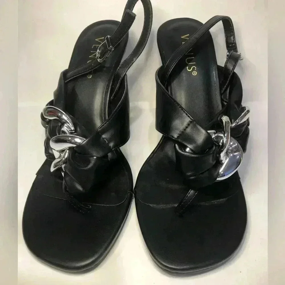 Black and silver heels size 7.5